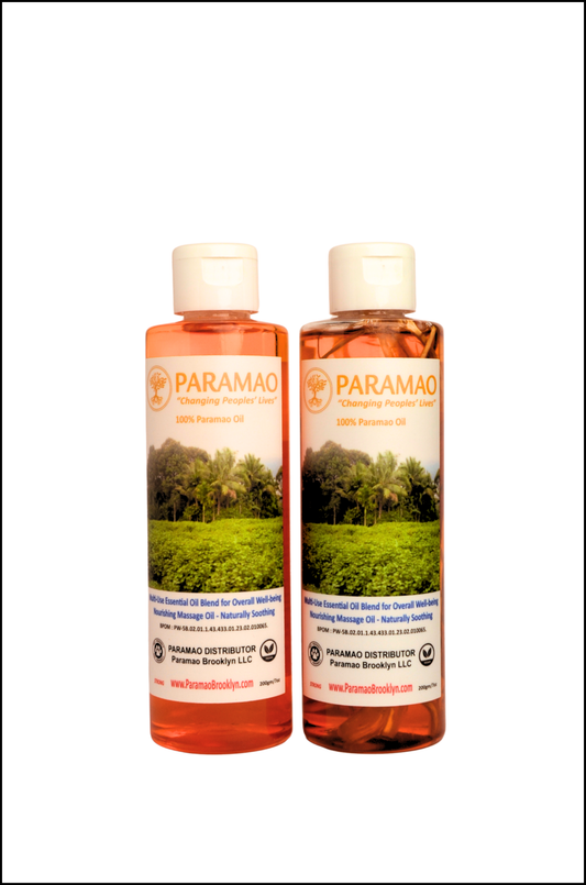 Two bottles of 100% Pure Paramao oil manufactured in Indonesia for overall wellness. One with the root in the bottle and the refill without root.